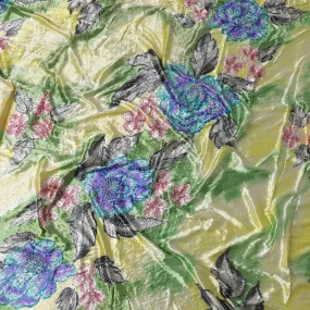 Baby yellow Rayon velvet fabric with multicolor print having silver and yellow stonework in floral design