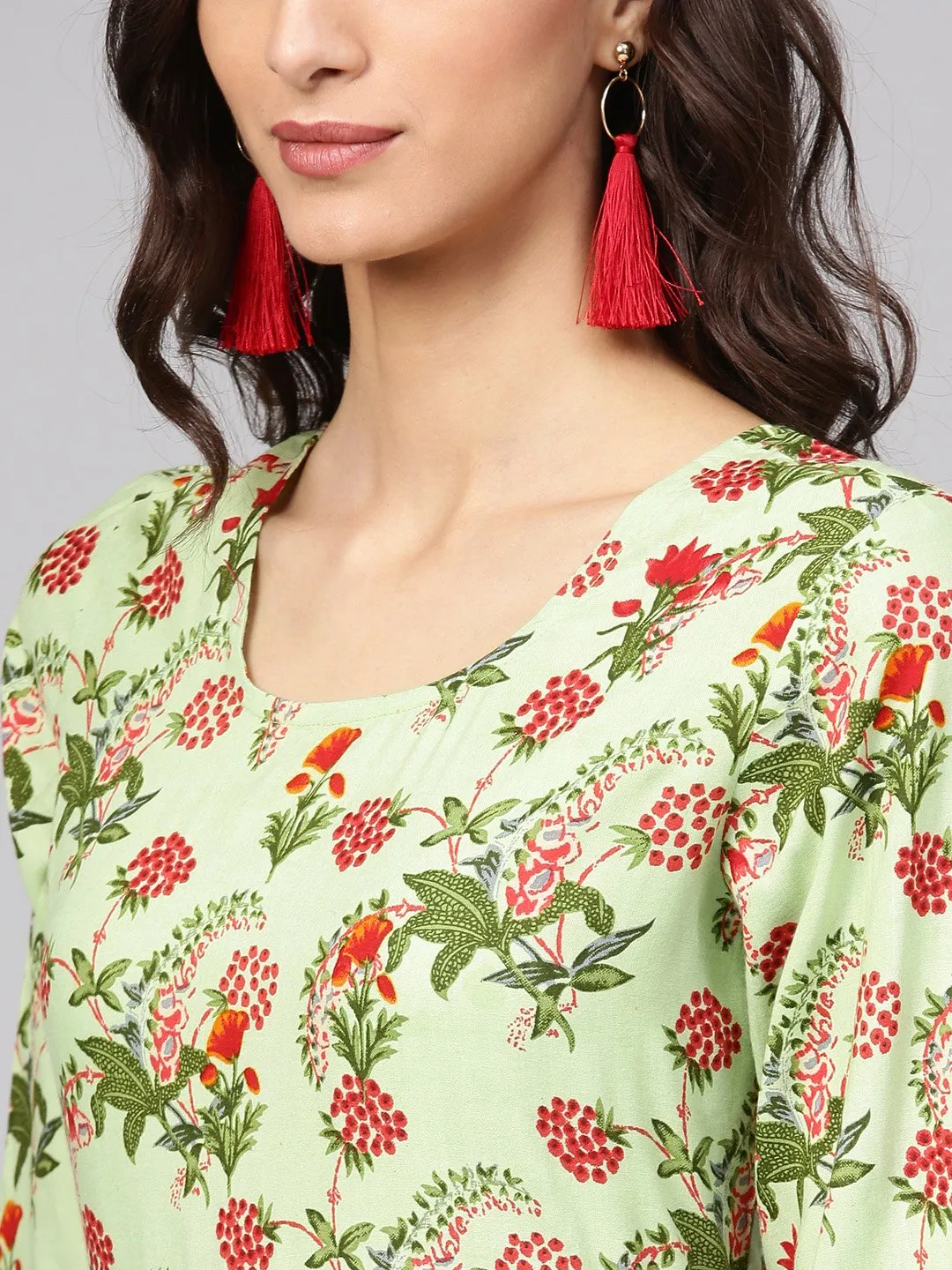 Pastel green floral printed A-line cotton kurta with solid coral culottes