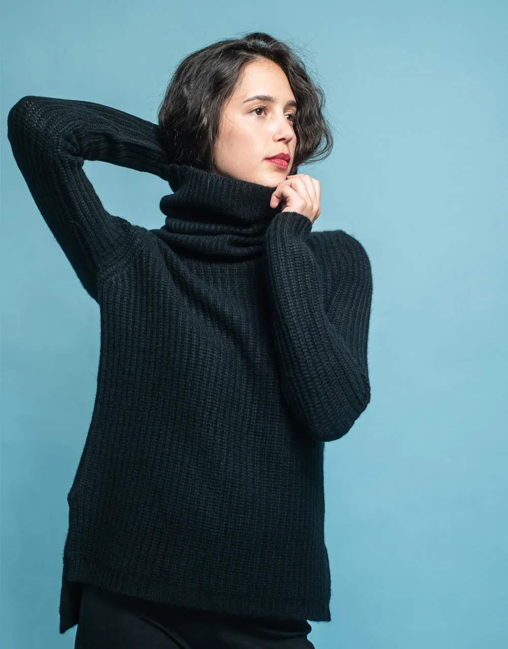 Rib Knit Turtleneck Sweater in Black