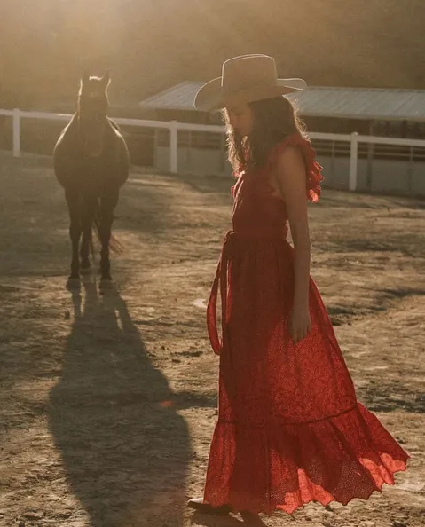 The Great - The Eyelet Apron Dress in Cardinal